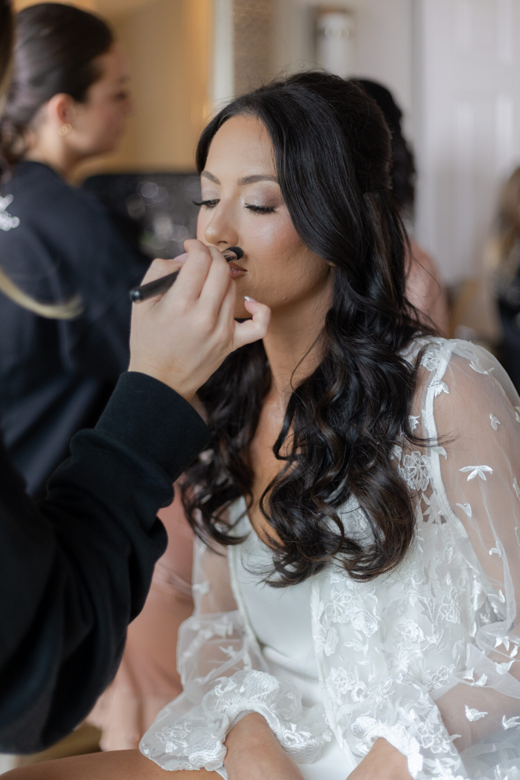 Bride getting make-up final touches at NJ Vineyard Wedding Venue