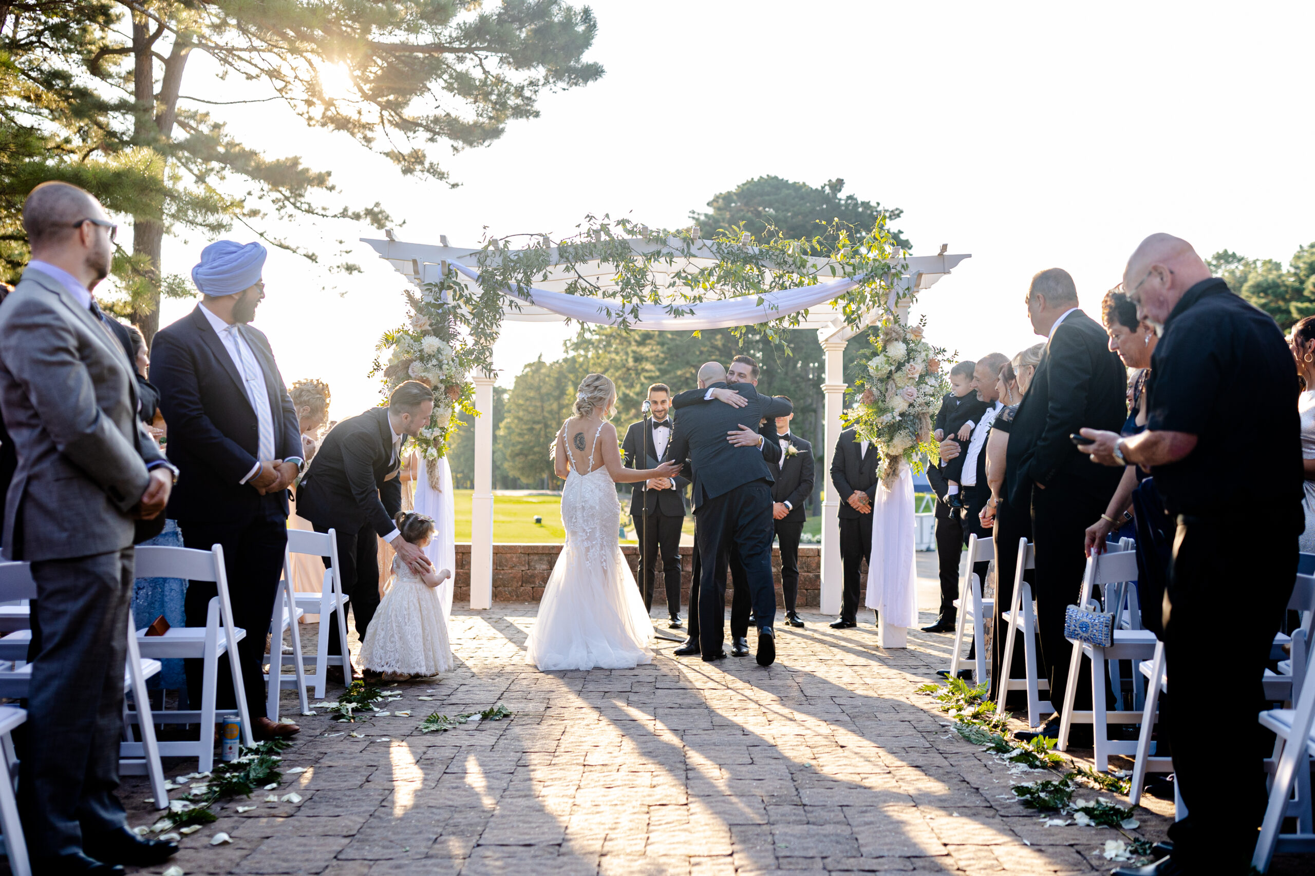 Bride and groom during outdoor wedding ceremony