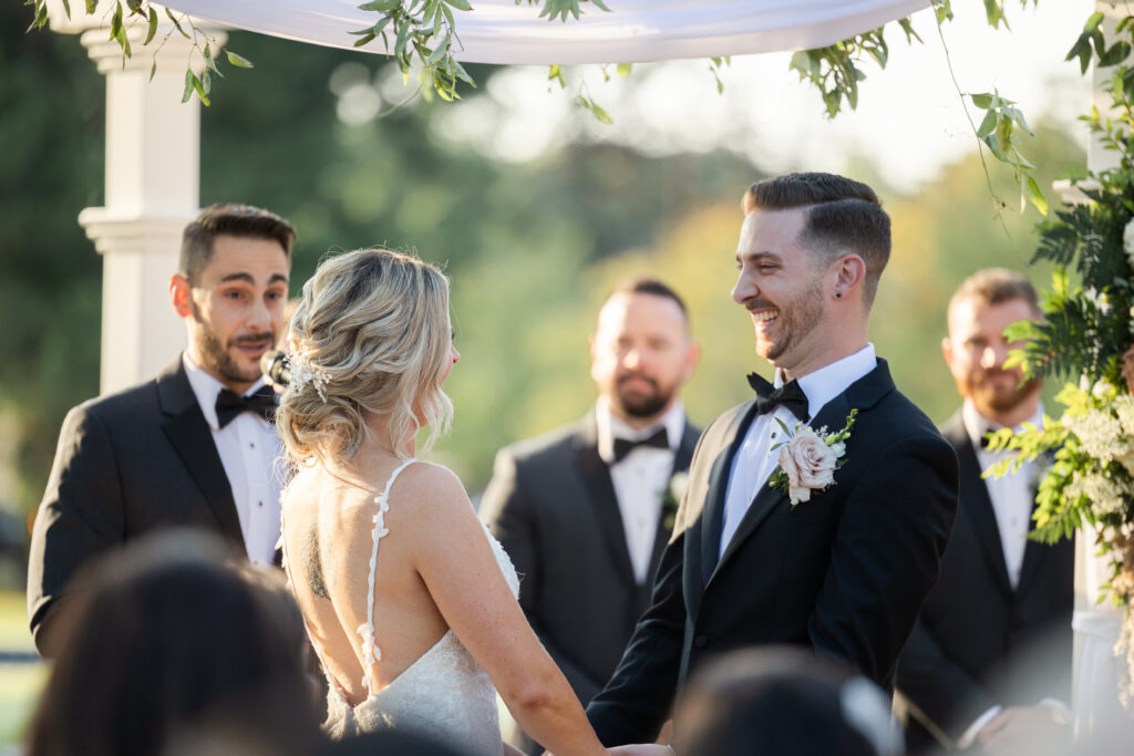 Bride and groom during outdoor wedding ceremony