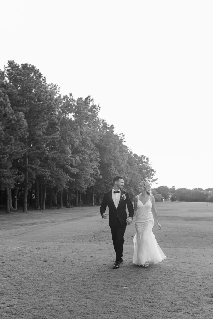 Bride and groom on golf course