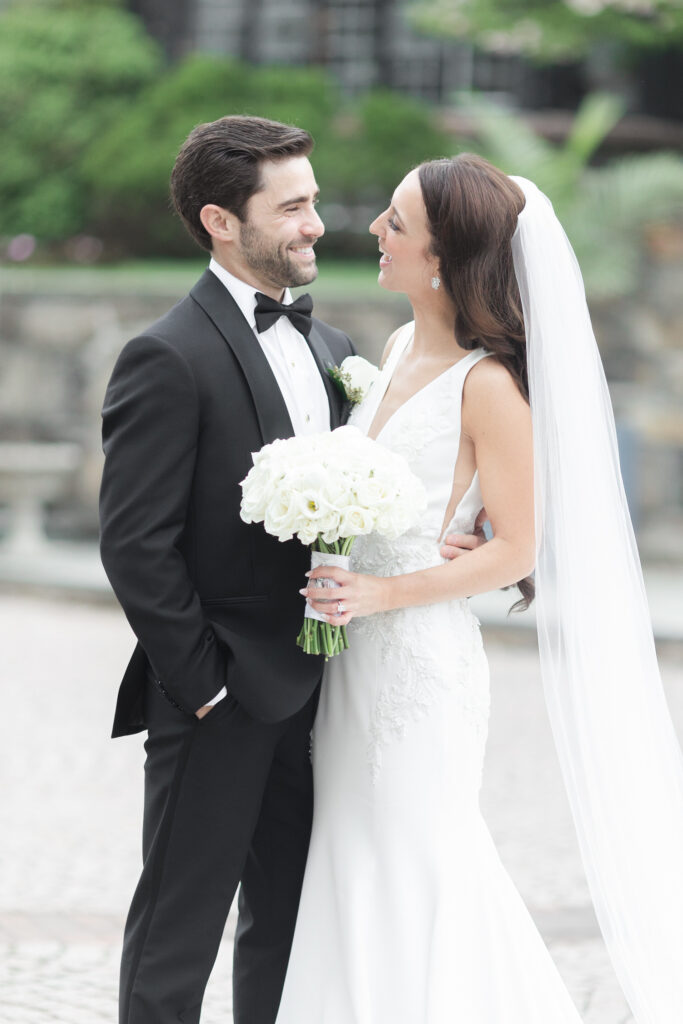 Bride and groom in front of New Jersey Castle Wedding venue