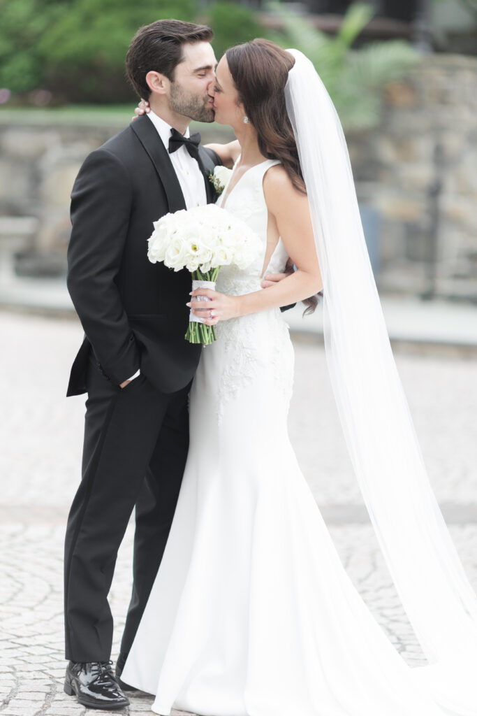 Bride and groom in front of New Jersey Castle Wedding venue