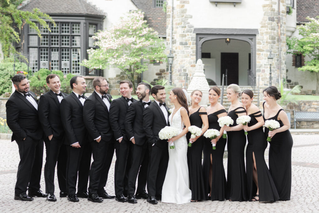 Wedding party in front of northern New Jersey castle wedding venue