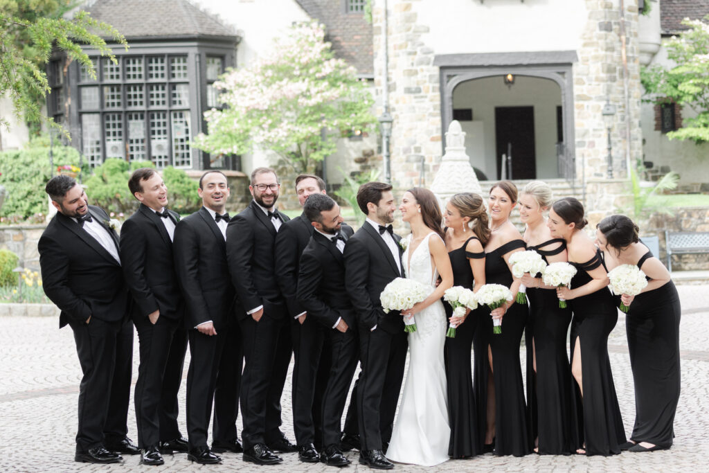 Wedding party in front of northern New Jersey castle wedding venue