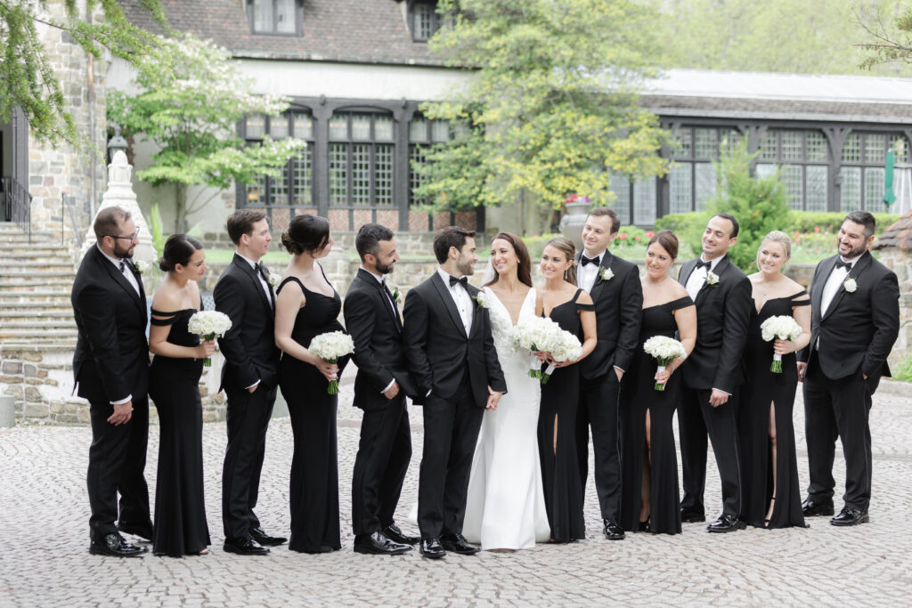 Wedding party in front of northern New Jersey castle wedding venue