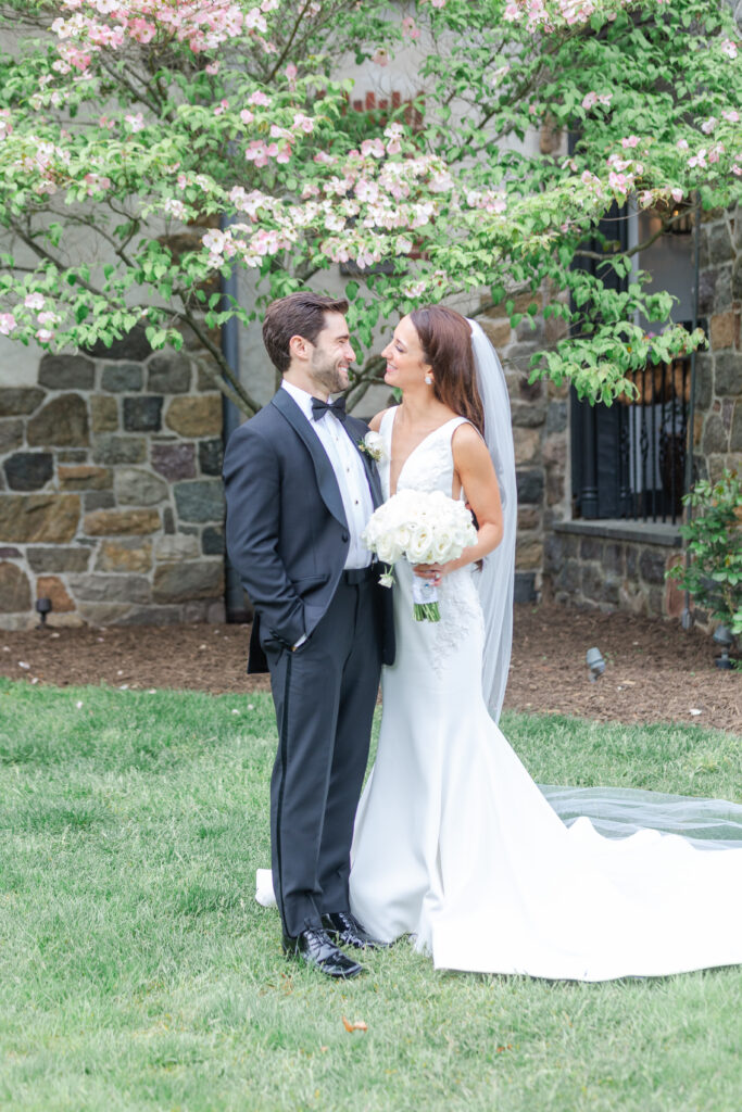 Bride and groom outside of northern New Jersey castle wedding venue