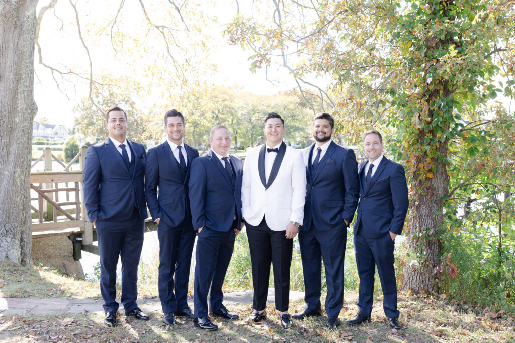 Groom and groomsmen at Spring Lake, New Jersey, at Divine Park 