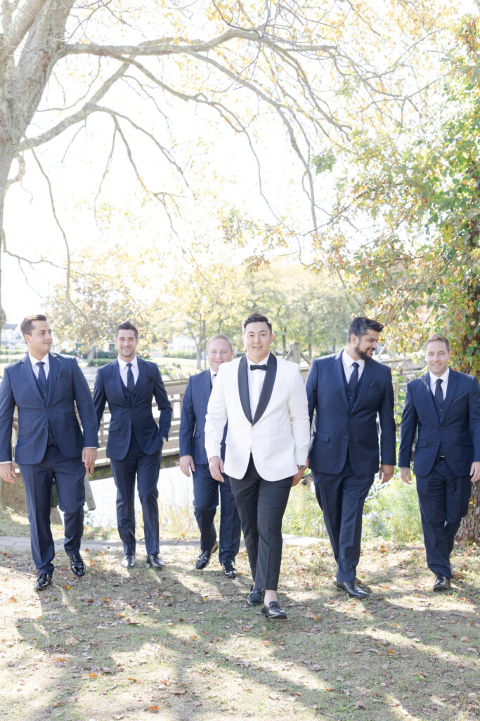 Groom and groomsmen at Spring Lake, New Jersey, at Divine Park