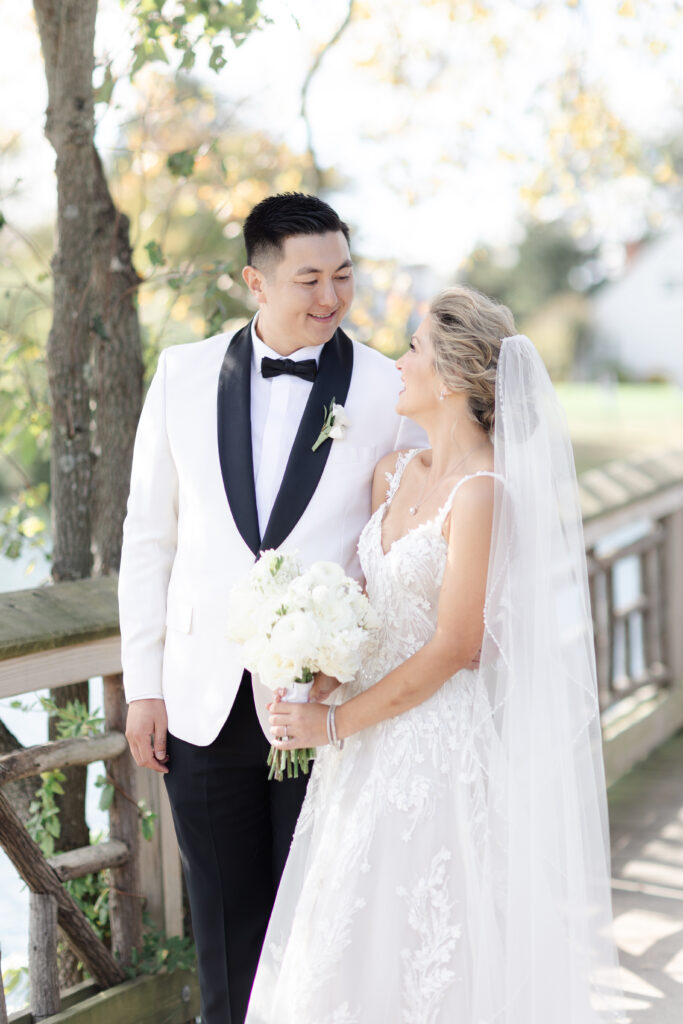 Outdoor first look with bride and groom at Divine Park