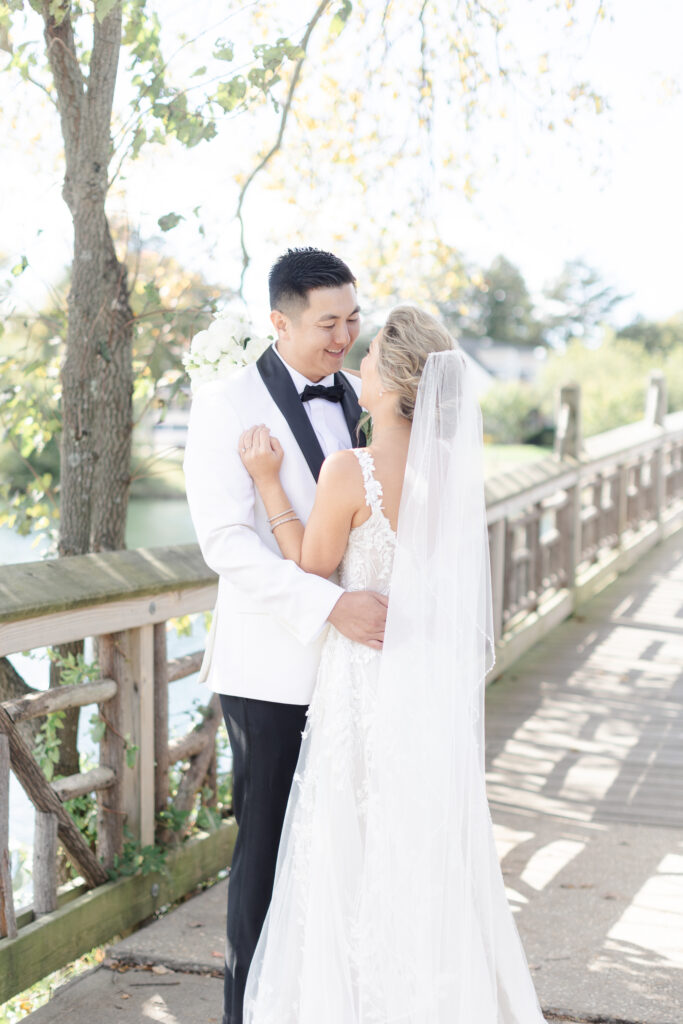 Bride and groom portraits at Wooden Bridge, Divine Park Spring Lake New Jersey