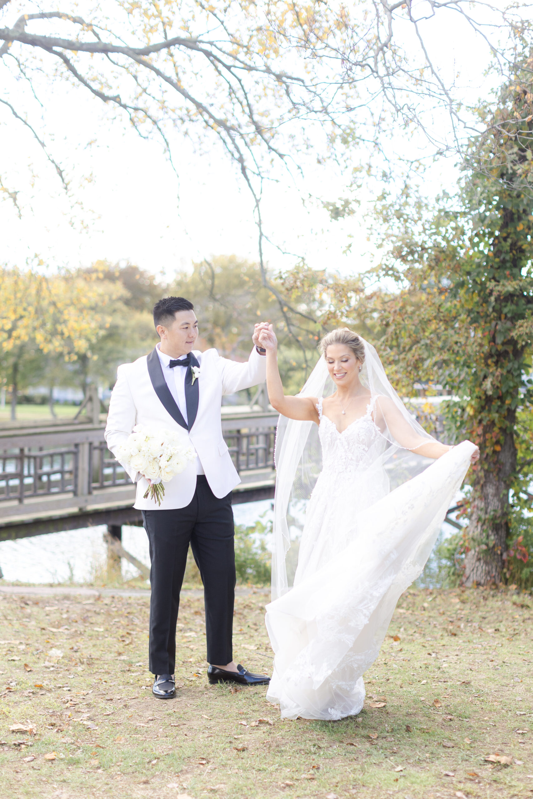 Bride and groom portraits in front of Wooden Bridge, Divine Park, Spring Lake NJ