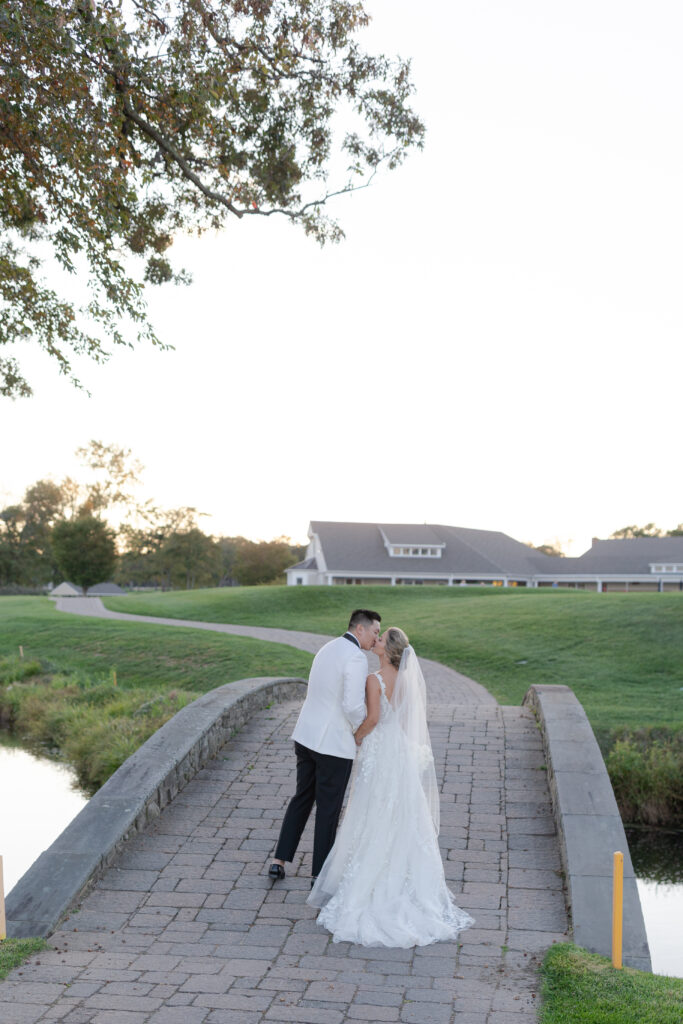 Bride and groom sunset photos at golf club wedding venue