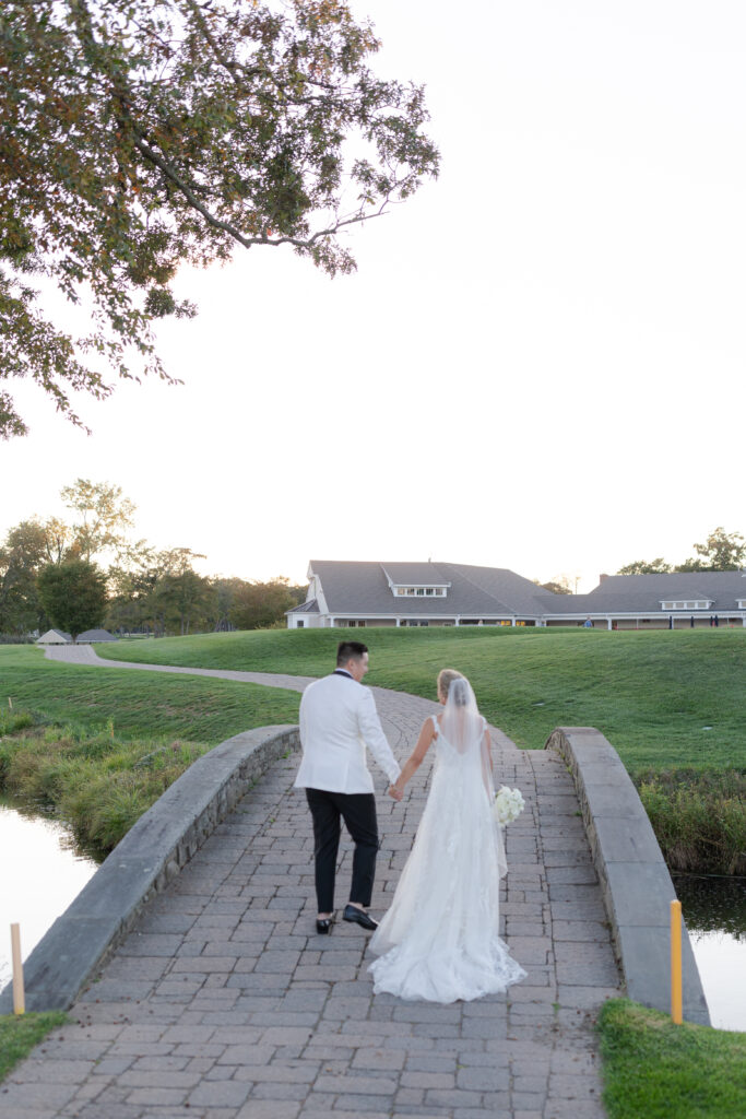 Bride and groom sunset photos at golf club wedding venue