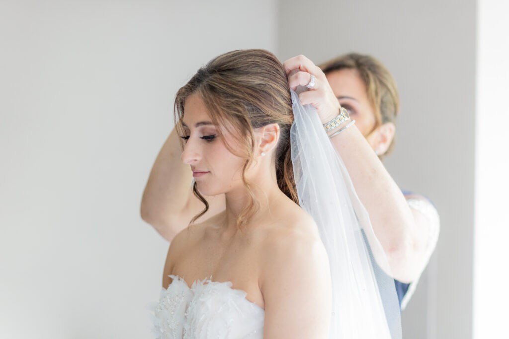 Bridesmaid first look with wedding dress