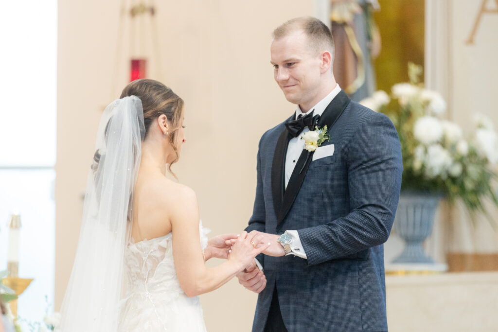 Bride and groom exchange rings