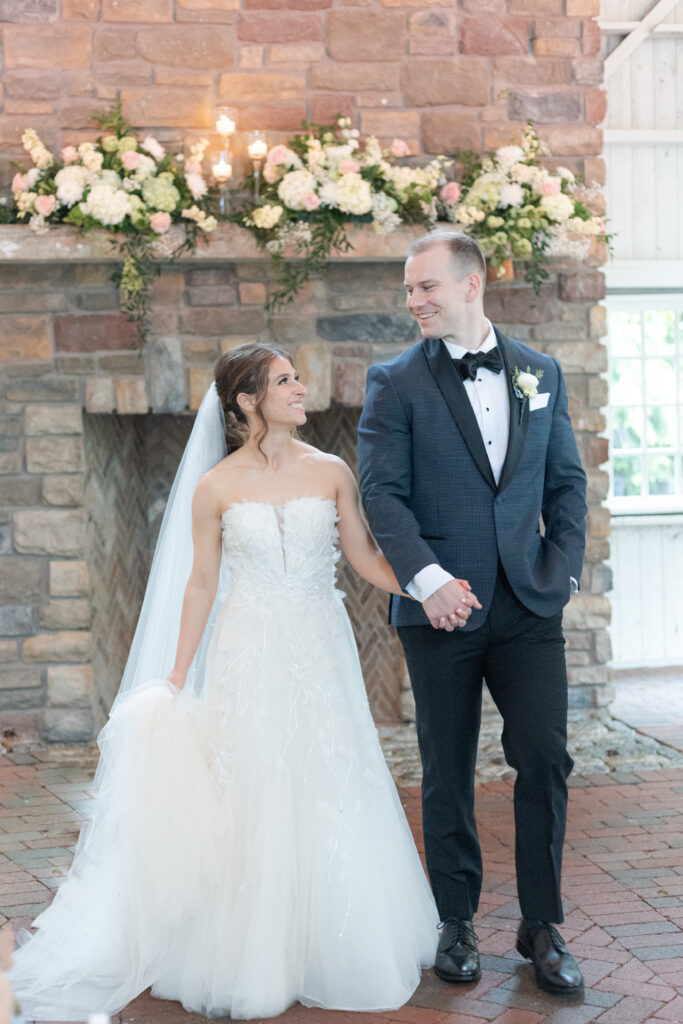 Bride and groom inside The Ashford Estate's Red Barn