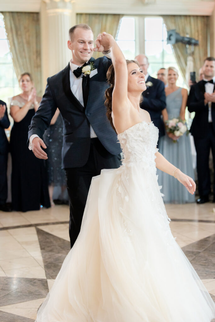 Bride and groom's first dance inside Ashford Estate ballroom