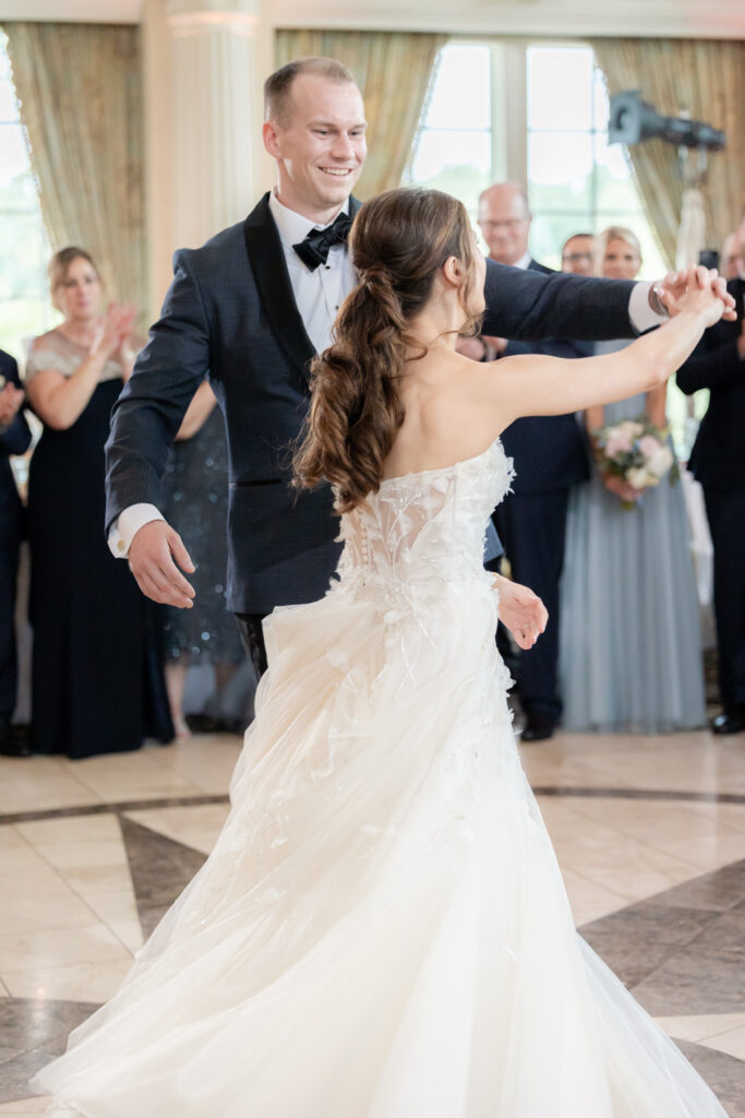 Bride and groom's first dance inside Ashford Estate ballroom