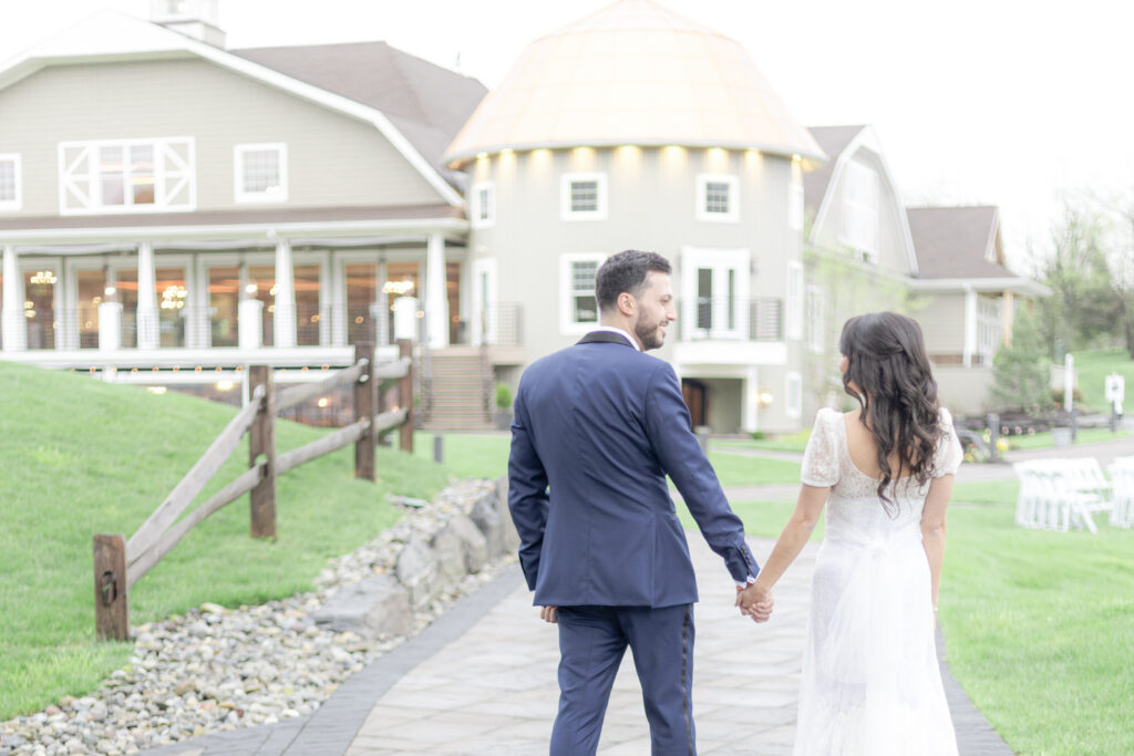 Bride and groom portrait in front of Bear Brook Valley