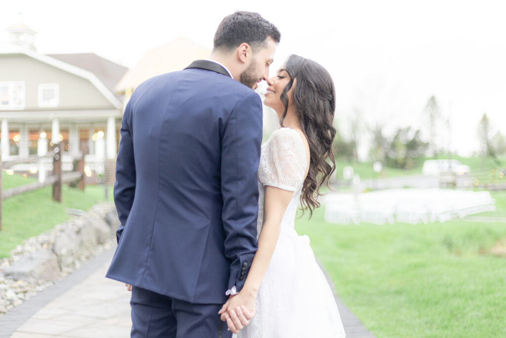 Bride and groom portrait in front of Bear Brook Valley