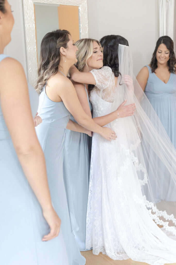 Bridesmaid first look reveal reactions inside bridal suite