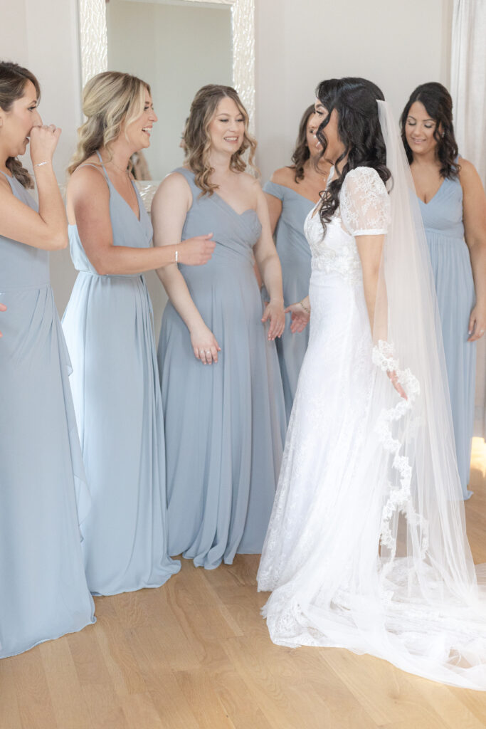 Bridesmaid first look reveal reactions inside bridal suite