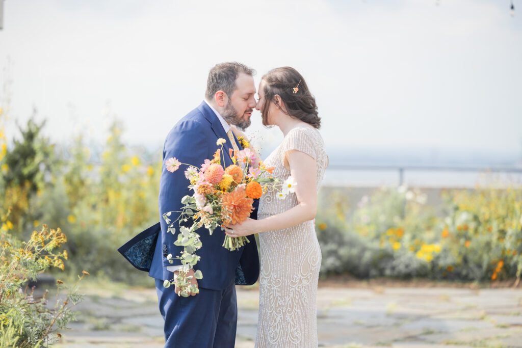 First look moment between bride and groom at Brooklyn rooftop venue