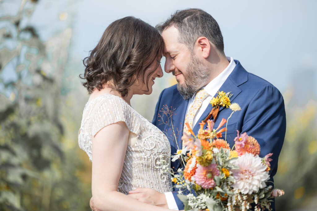 Bride and groom portraits on Brooklyn Grange Sunset Park rooftop