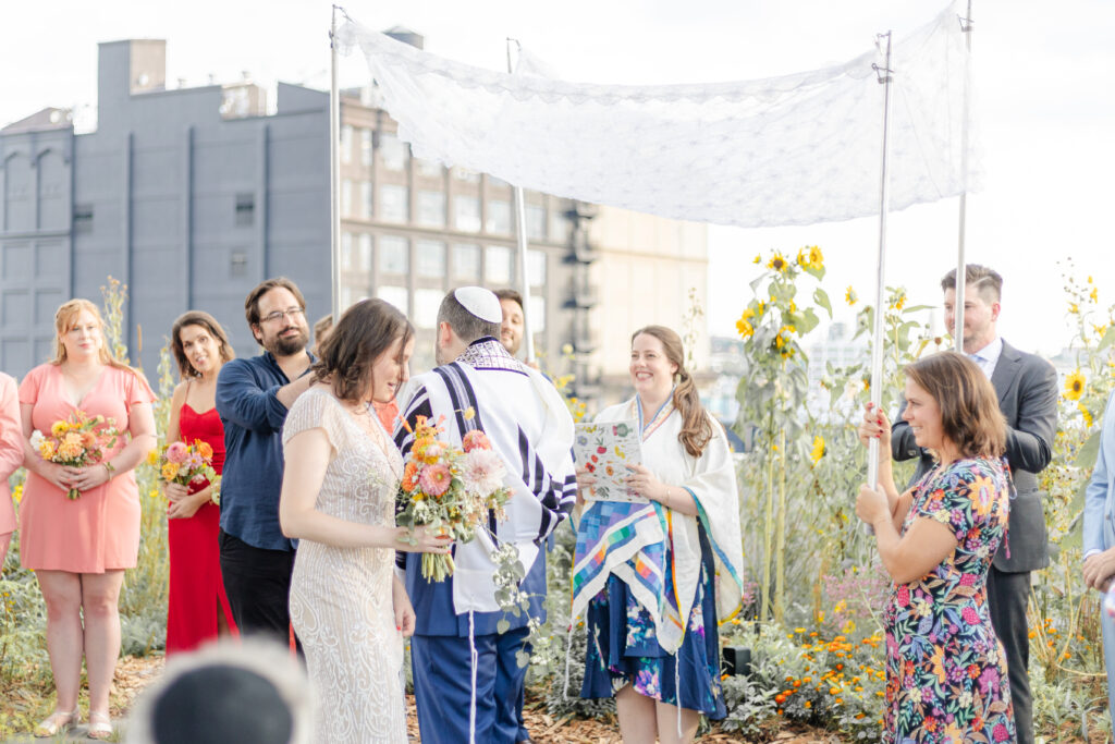 Jewish wedding ceremony at venue rooftop