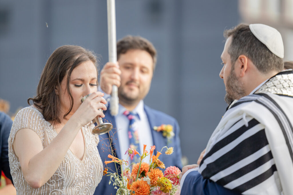 Jewish wedding ceremony at venue rooftop