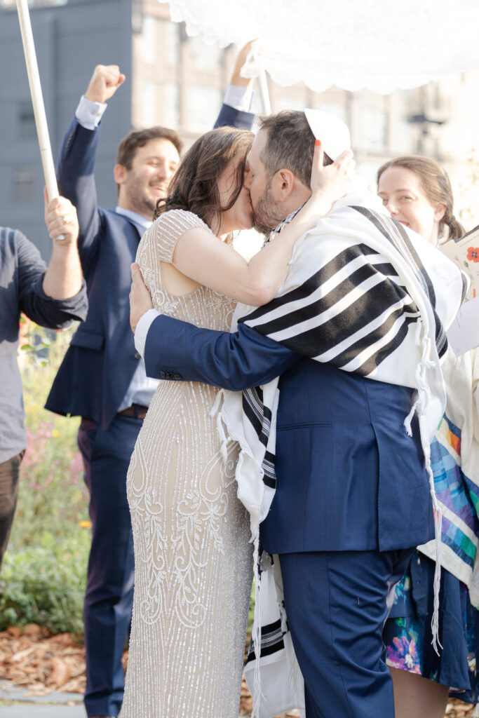 Kiss at aisle for Jewish wedding