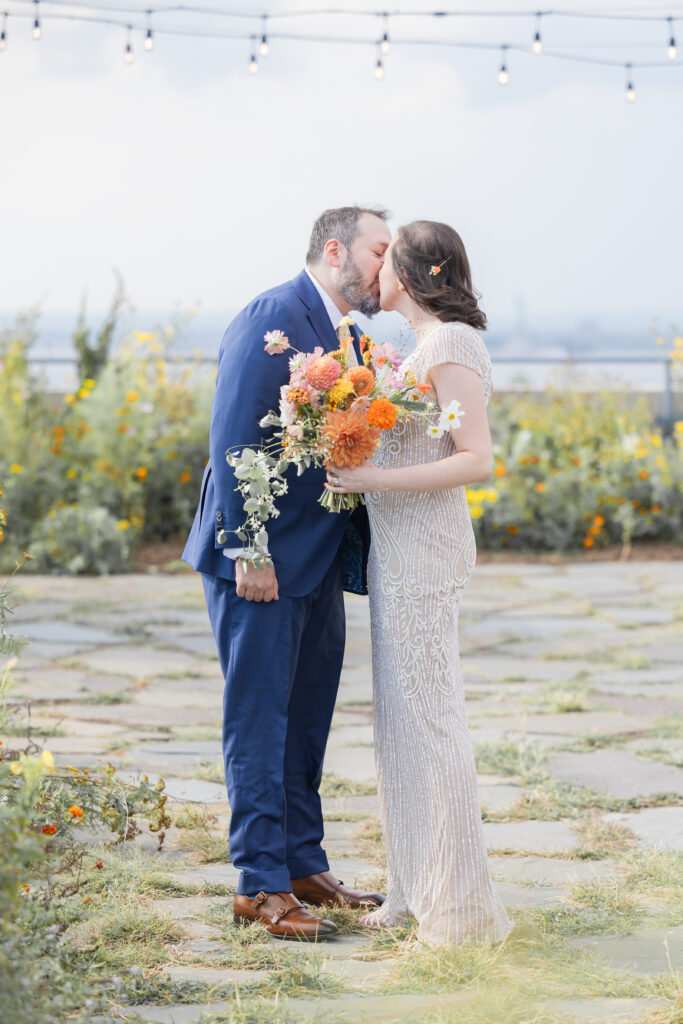 First look moment between bride and groom at Brooklyn rooftop venue