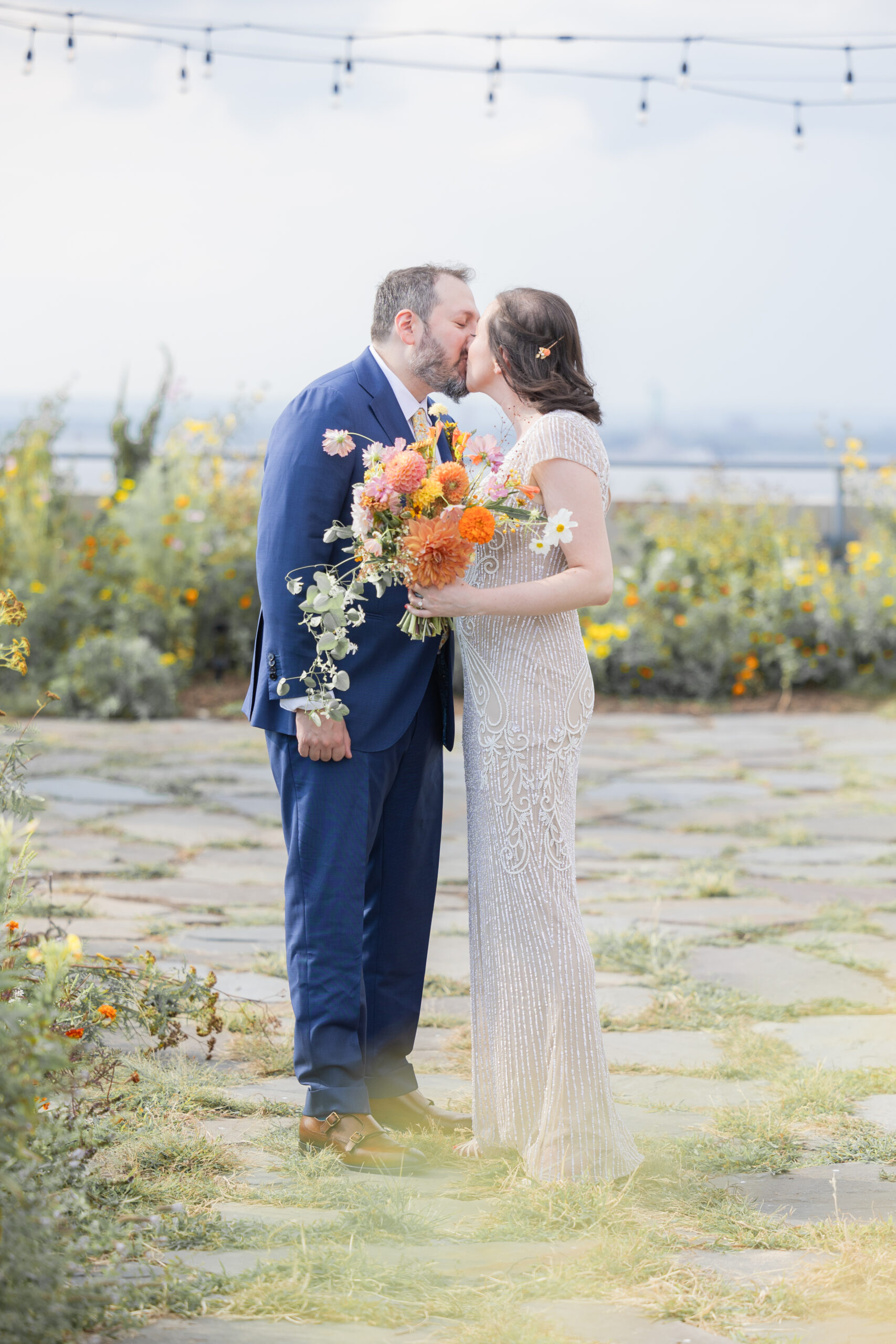 First look moment between bride and groom at Brooklyn rooftop venue