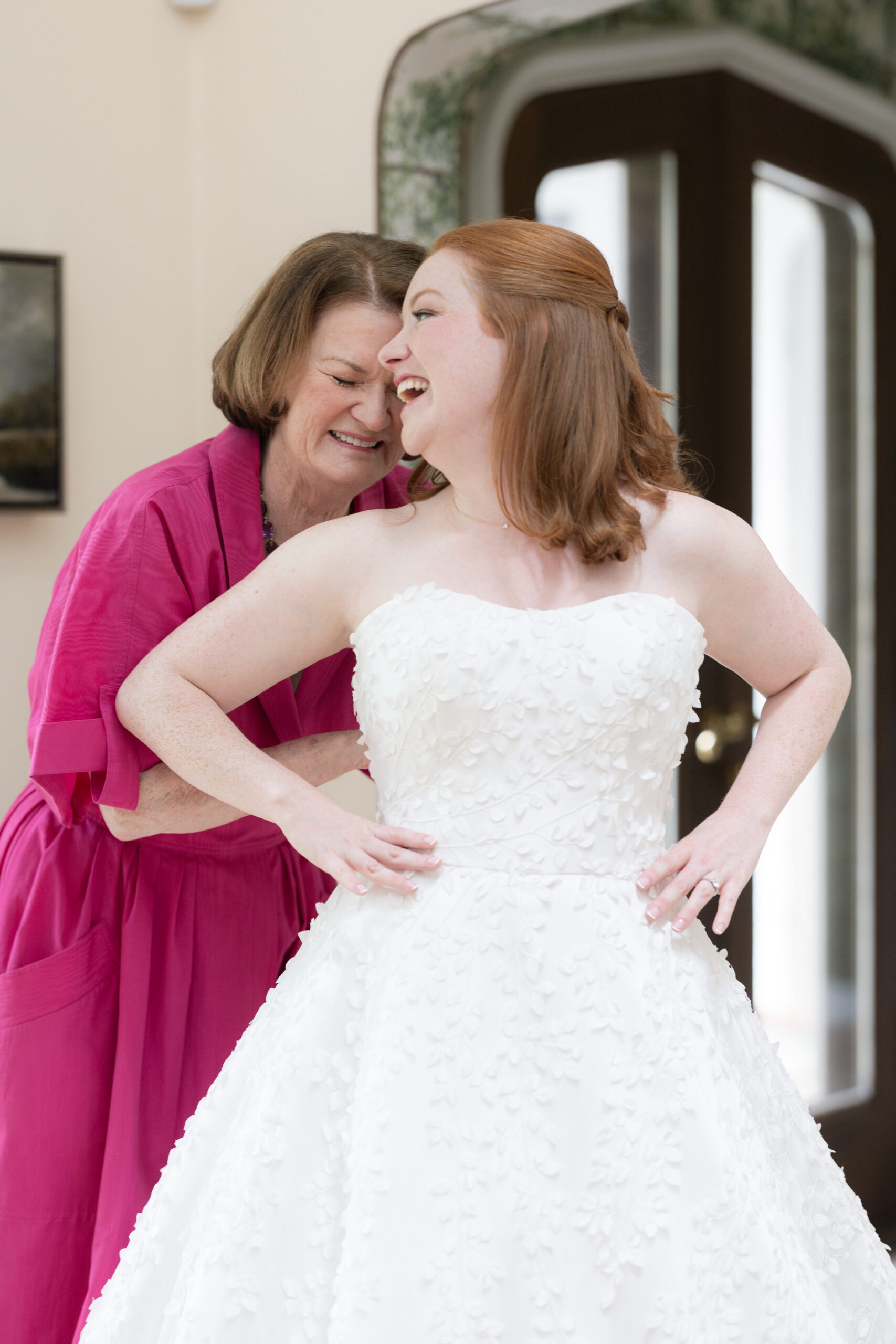 Bride and mom getting dressed