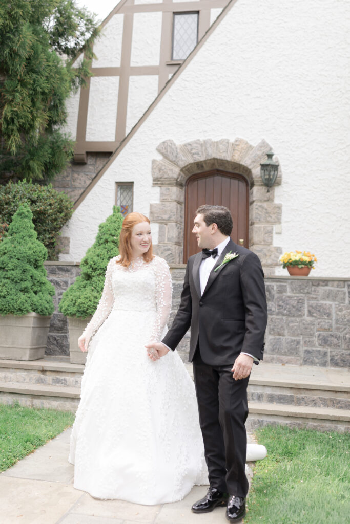 Bride and groom in front of Larchmont house