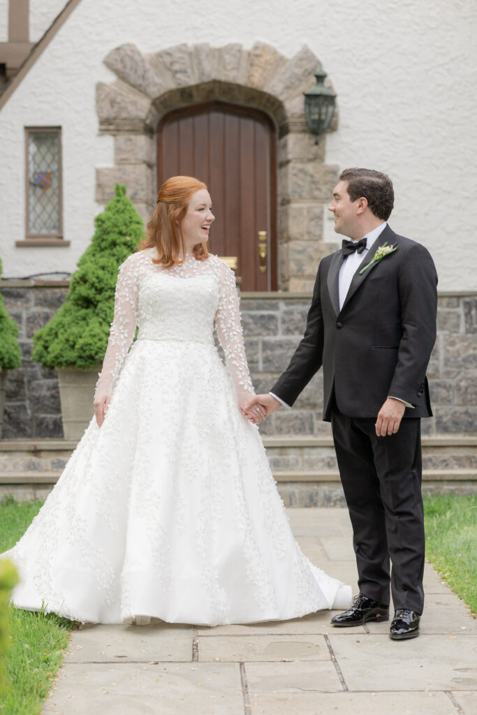 Bride and groom in front of Larchmont house