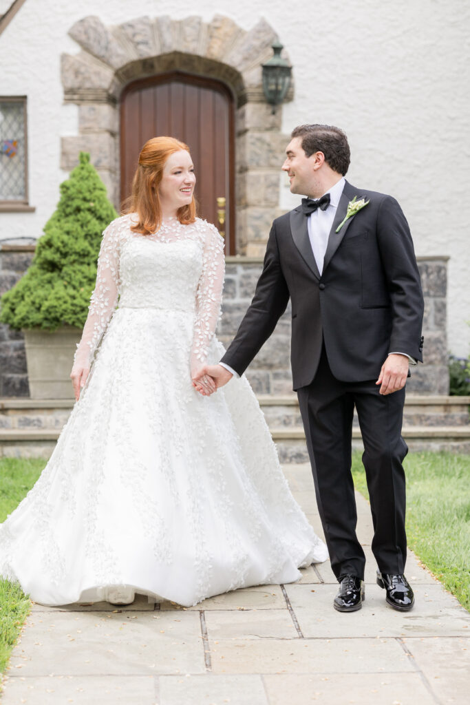 Bride and groom in front of Larchmont house