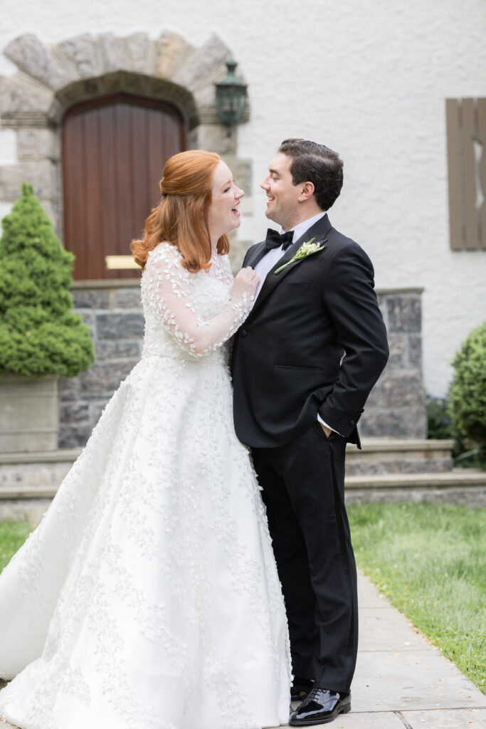 Bride and groom in front of Larchmont house