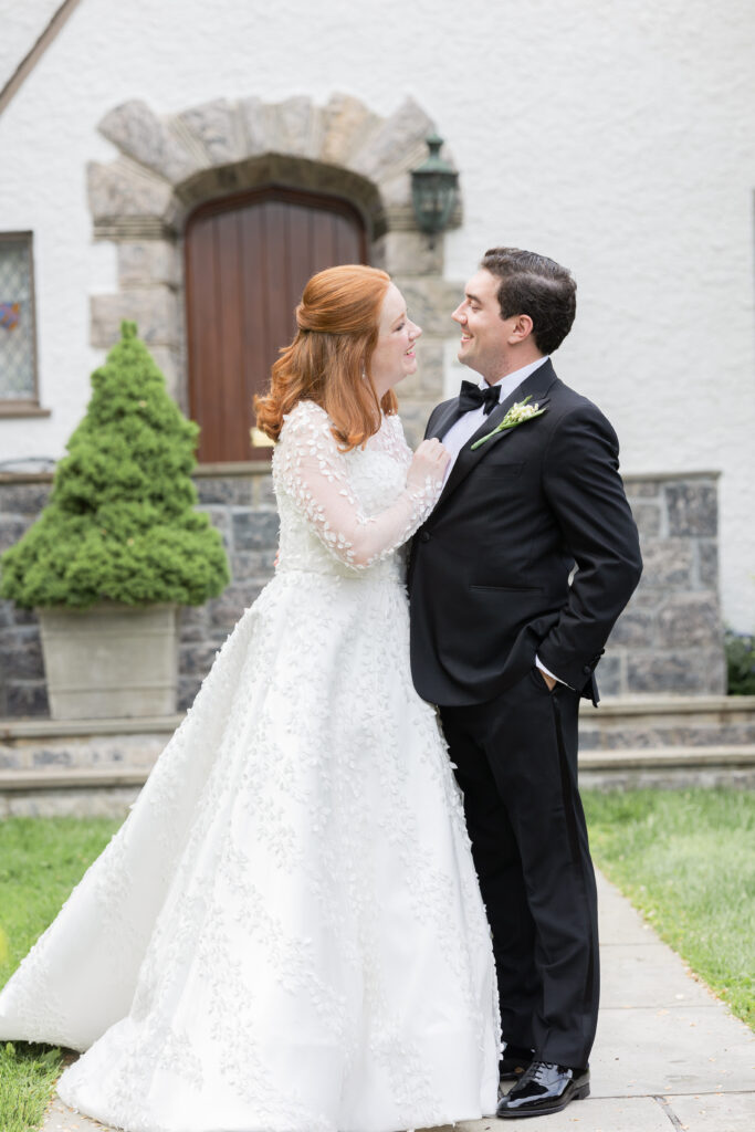 Bride and groom in front of Larchmont house