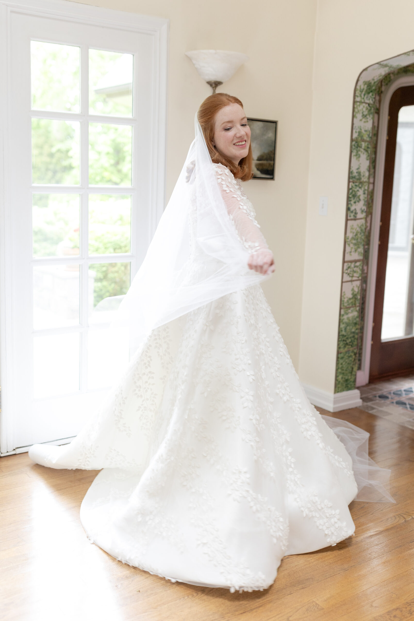 Bride playing with her veil