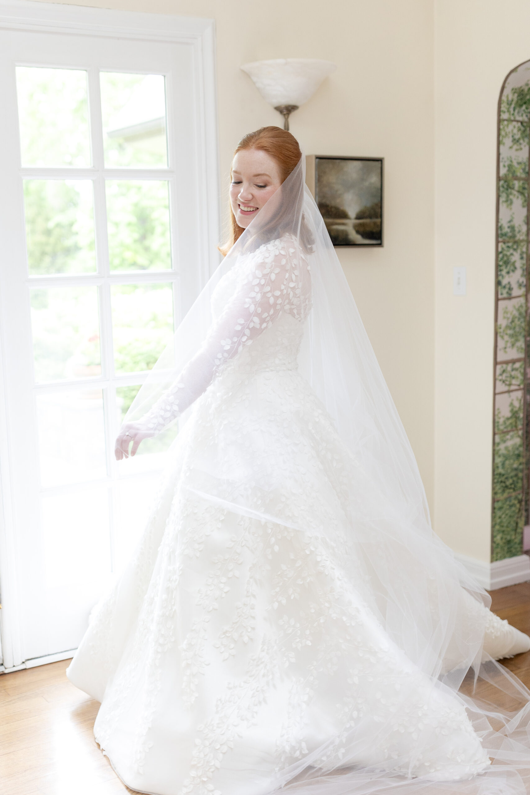 Bride playing with her veil