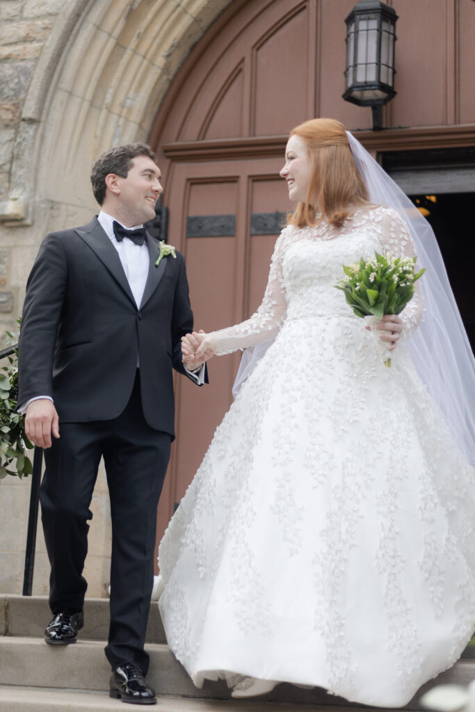 Bride and groom outside of Larchmont Church