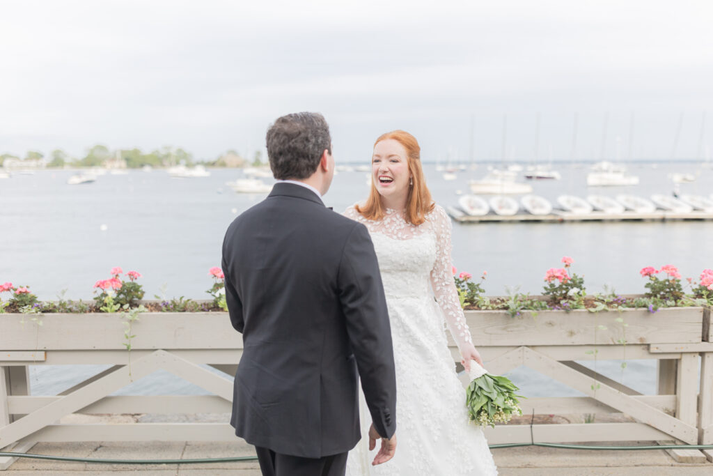 Bride and groom in front of Larchmont Yacht Club wedding venue