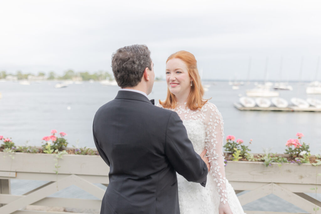 Bride and groom in front of Larchmont Yacht Club wedding venue