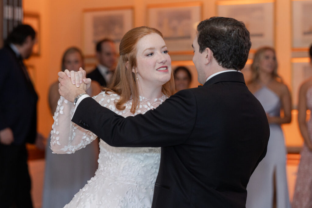 Reception first dance inside Larchmont Yacht Club wedding venue 