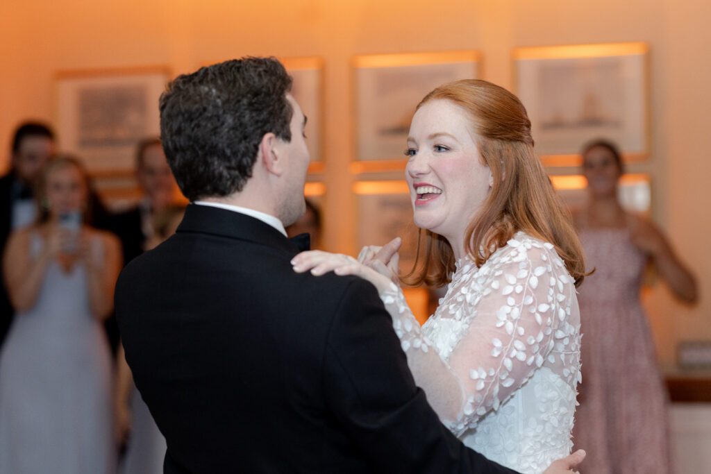 Reception first dance inside Larchmont Yacht Club wedding venue 