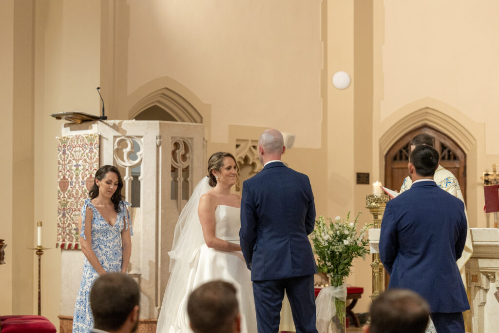 Bride and groom wedding ceremony inside church ceremony