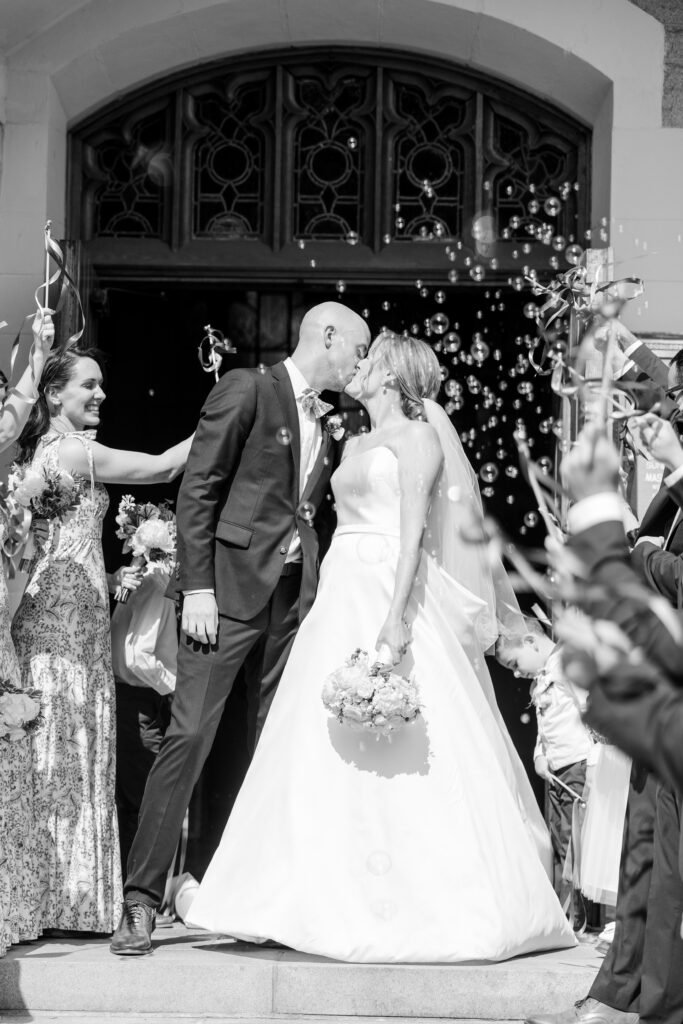 Bride and groom exiting wedding church