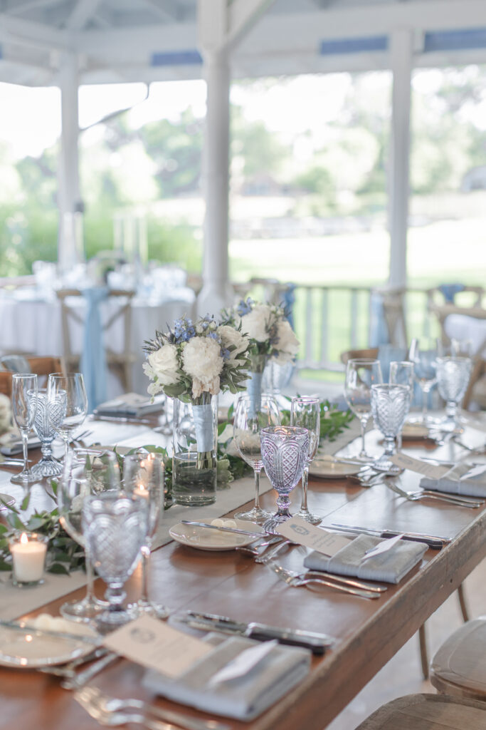 Wedding reception table details with centerpieces