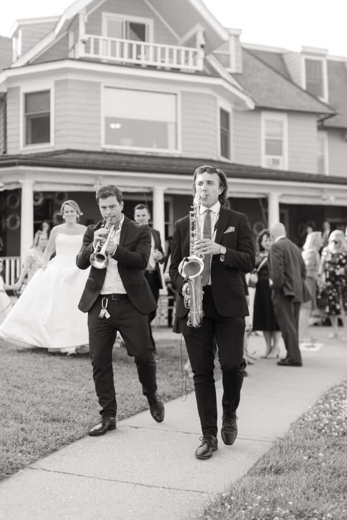 Black and white musician playing saxophone